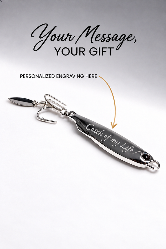 A silver metal fishing lure with custom engraving on its body, shown on a white background with promotional text reading 'Your Message, YOUR GIFT' and 'PERSONALIZED ENGRAVING HERE'.